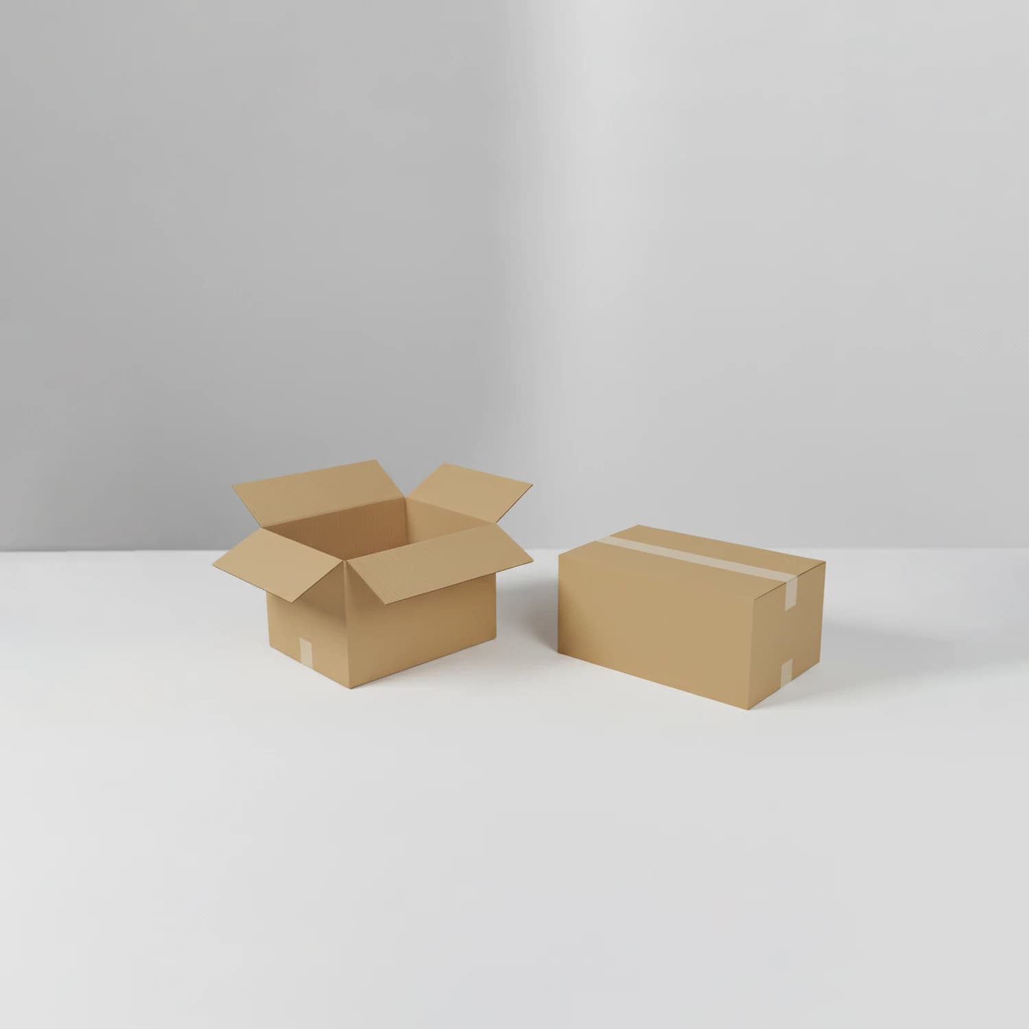 Two corrugated shipping cartons: one open, one sealed with tape